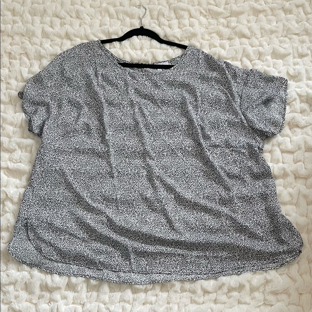 EUC tunic style black & white patterned blouse. Boat neck. Longer in the back.